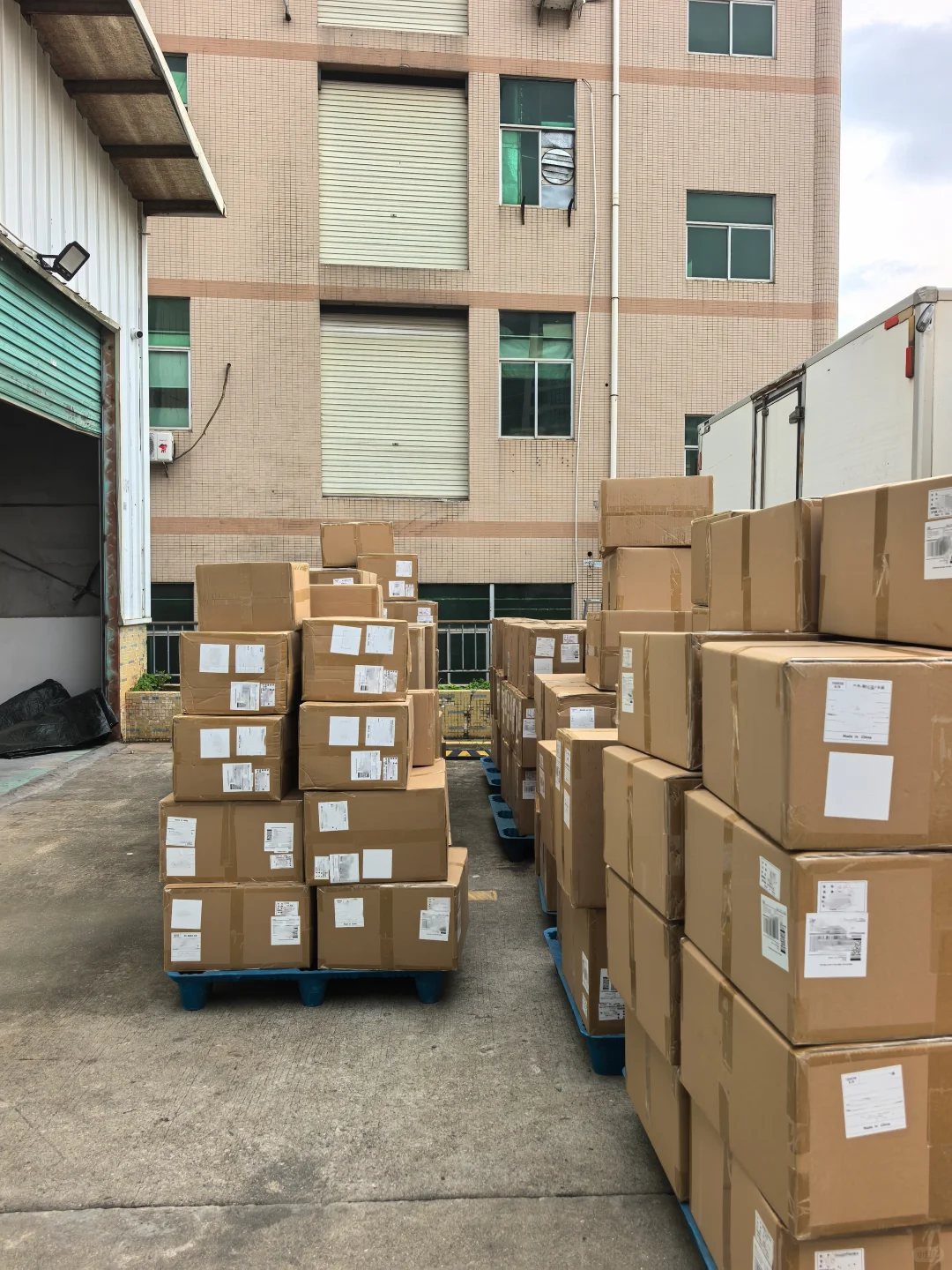 Palletized cartons outside a cargo loading area
